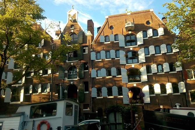 1,5 hours Amsterdam Rickshaw Tour - Nieuwmarkt and the old city gateway
