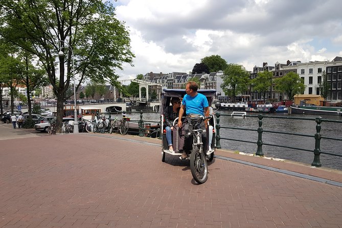 1,5 hours Amsterdam Rickshaw Tour - Starting at your hotel or cruise dock
