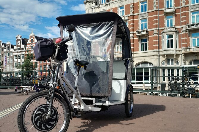 1 hour Amsterdam City Tour in Pedicab - The Bloemenmarkt and Amsterdam’s canal belt