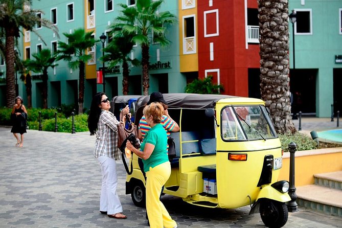 2-Hour TukTuk Rental with an Experienced Guide and Driver - Punda: color, commerce, and street scenes