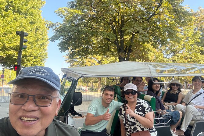 4 Hour Grand Paris Tour by Electric Tuk Tuk See Almost Everything - Arc de Triomphe and the grand western avenues