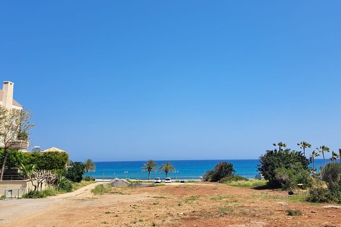 7 Villages Tuk Tuk Tour in Crete with Free Time in Sissi - Hersonissos by beach, port, and shopping street