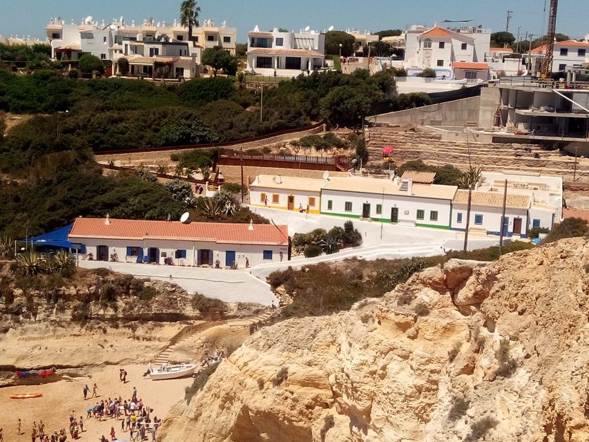 Albufeira: Benagil Caves & Senhora da Rocha Tour by Tuk Tuk - Carvoeiro’s coastline and village feel