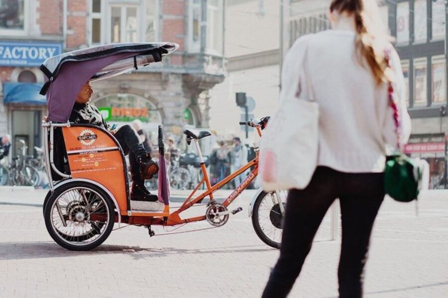 Amsterdam: Private Guided City Tour by Pedicab - The canal belt from a street-level seat