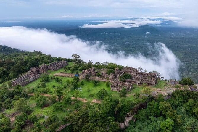 Angkor Wat Sunrise by Tuk Tuk – Personalized Private Tour - Victory Gate and the smiling faces of Bayon
