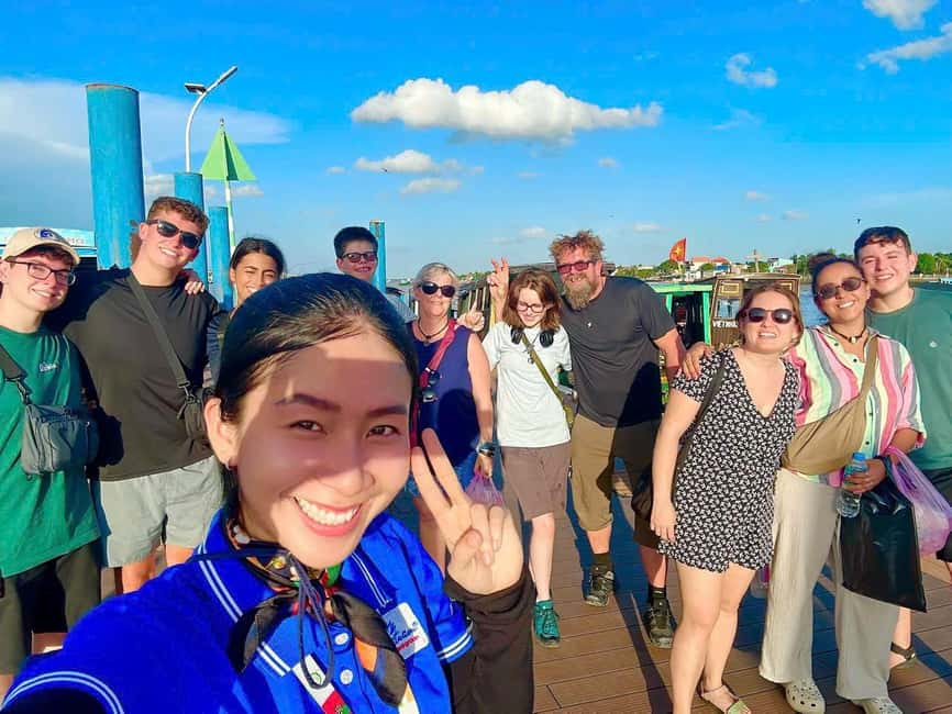Authentic Mekong Delta: Tuk Tuk, Rowing Boat, Biking Tour - Cruising the Tien River toward Qui Islet