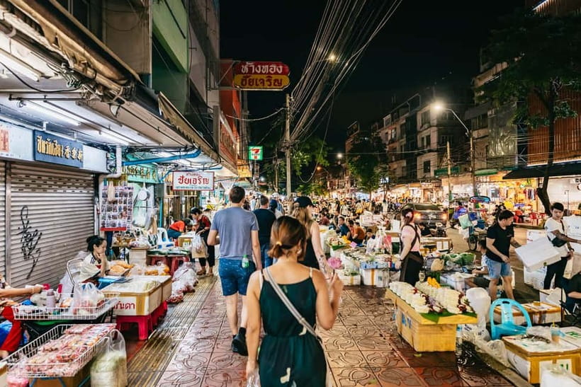 Bangkok: Midnight Food Tour by Tuk-Tuk - A cold drink with Wat Arun across the river
