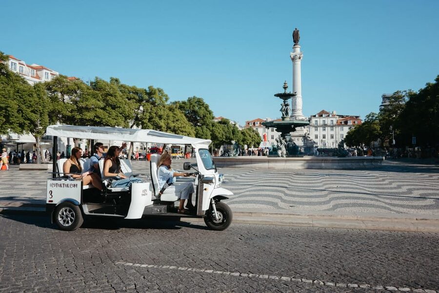 Belém: Private City Tour by Eco Tuk Tuk - Crossing Lisbon toward the 25 de Abril Bridge
