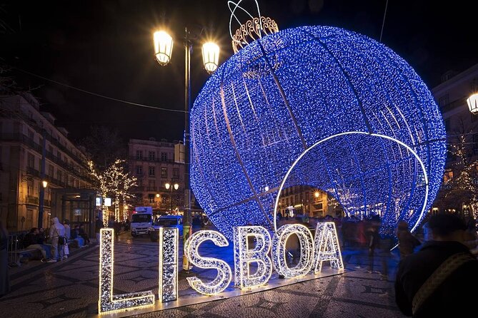 Christmas Lights Lisbon Tour with a Local in Private Eco Tuk Tuk - Baixa shows Lisbon’s formal center