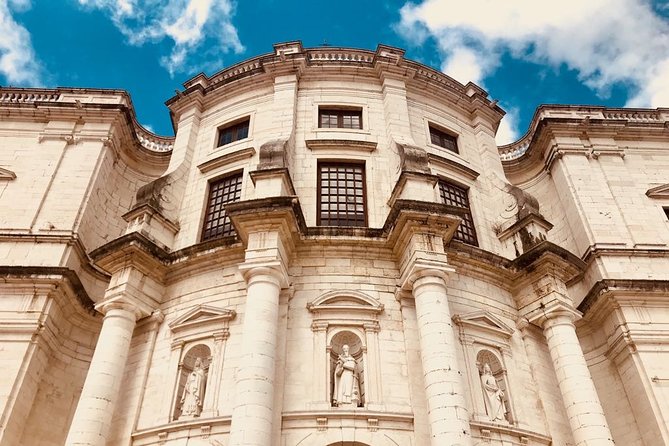 City of Neighborhoods Tour 1H 30M Private Tour by Tuk Tuk - Praça do Comércio opens onto the Tagus