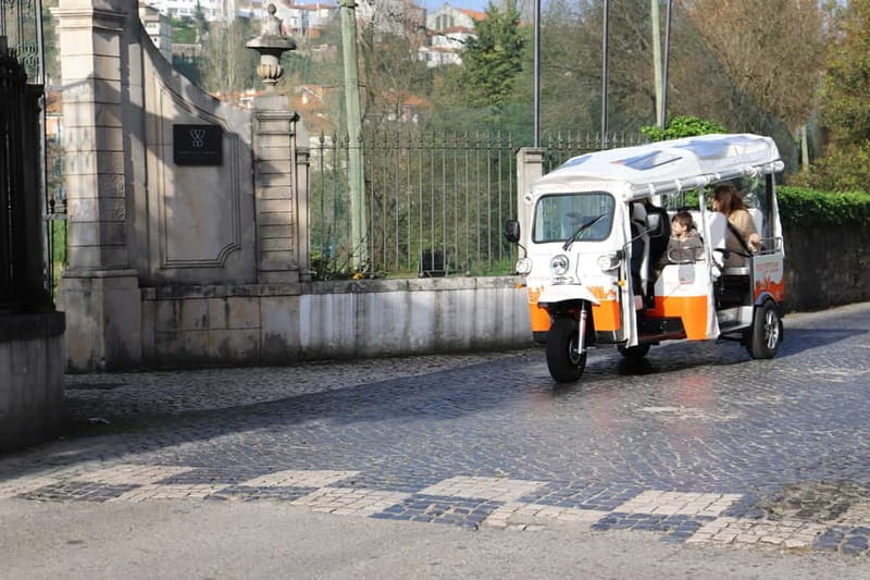 Coimbra: TukTuk Adventure. Local and multilingual host. Hotel pickup. - Major Seminary viewpoint: your first look across Coimbra