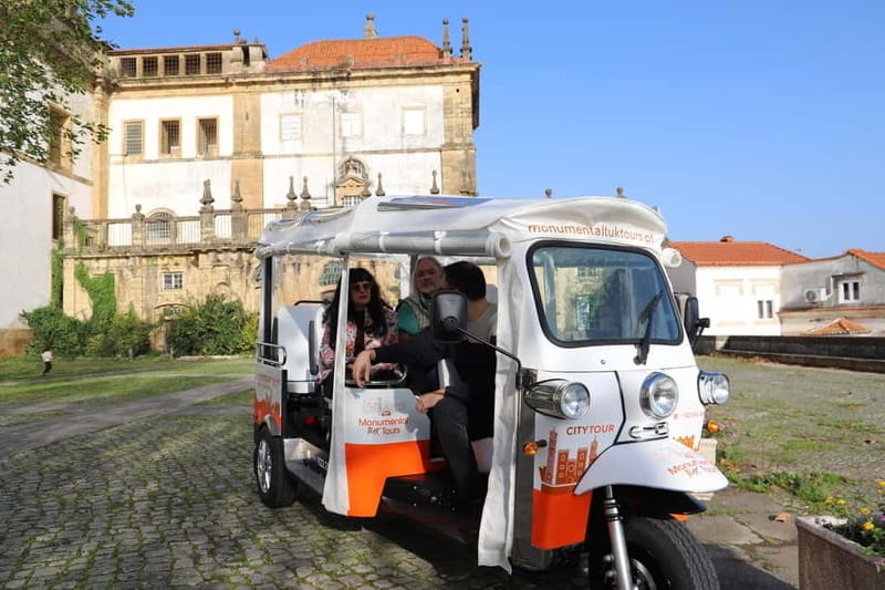 Coimbra: TukTuk Adventure. Local and multilingual host. Hotel pickup. - Starting at Largo da Portagem