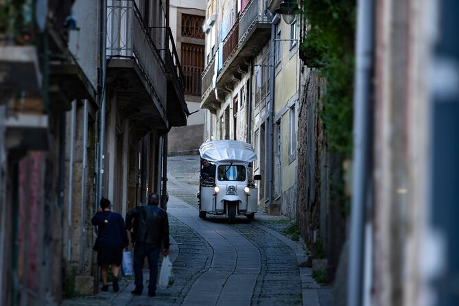 Discover Porto's Highlights on a 2-Hour Private Electric Tuk Tuk - Crossing Ponte do Infante between Porto and Gaia