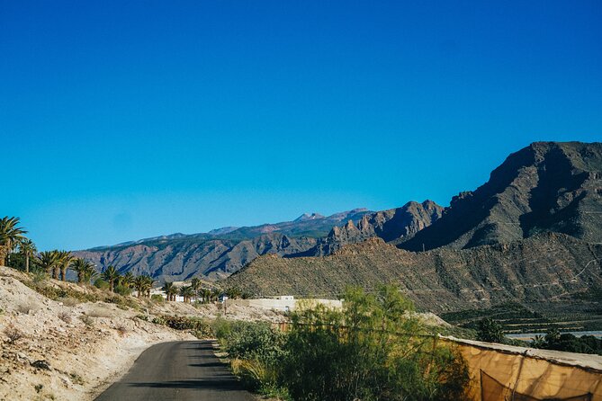 Double Tuk Tuk Tour in Costa Adeje - The black-sand beach and its religious past