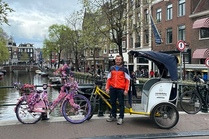 Explore Amsterdam in 75 Minutes – Pedicab Rickshaw City tour - Flexible guiding from Christian, Gabriel, or Krisztian