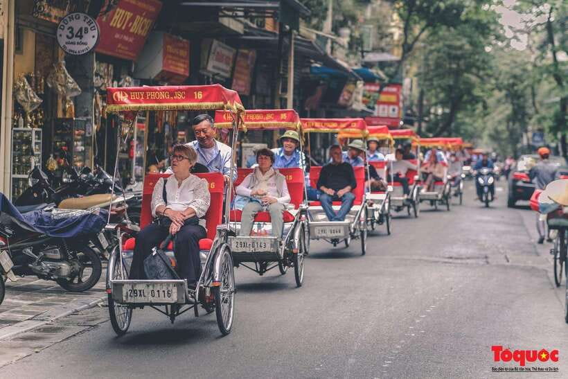 From Hanoi: City Sightseeing Cycling Panoramic Tour By Cyclo - Seeing Hanoi from the front seat of a cyclo
