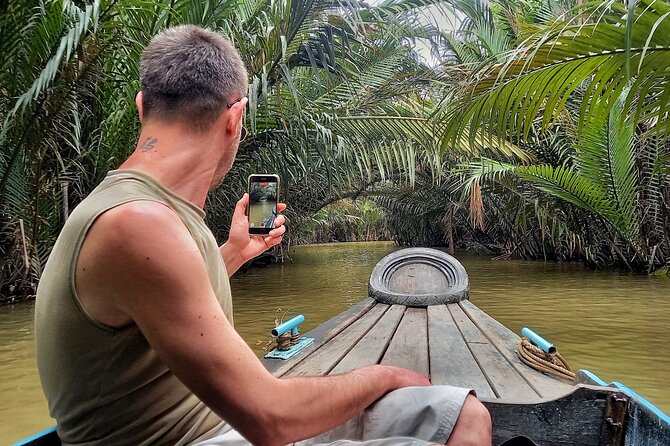 From Ho Chi Minh City: Discover Mekong Delta & Coconut Village - Entering the smaller canals near Ben Tre