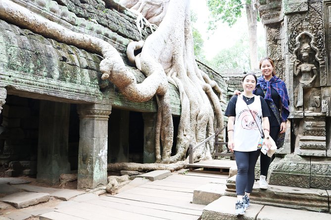 Full Day Angkor Park with Sunset by Tuk Tuk - Bayon’s stone faces reward a slow look