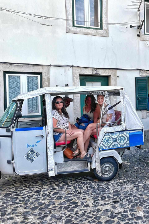 Guided Electric Piaggio Tuk-Tuk Tour of Historic Lisbon - Baixa begins the story at street level