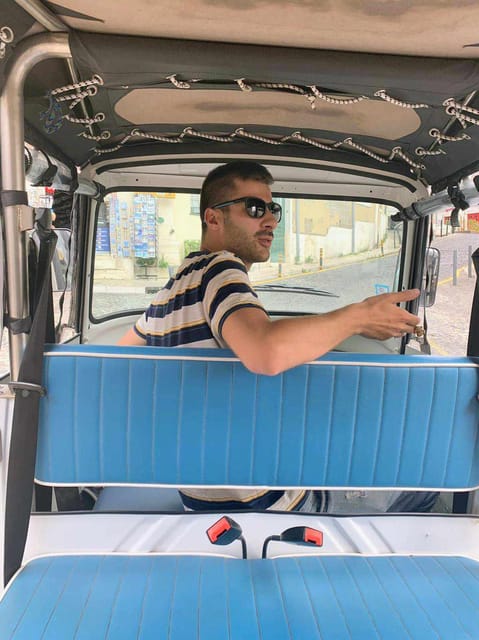 Guided Electric Piaggio Tuk-Tuk Tour of Historic Lisbon - Mouraria adds street life and cultural context