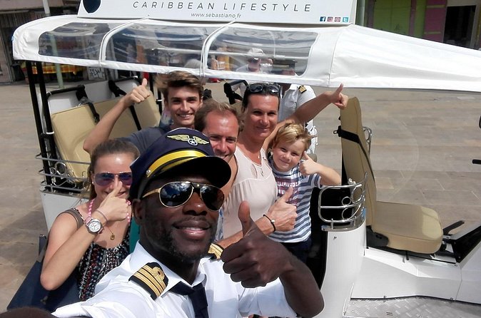 Guided tour by electric tuk-tuk - The Palace of Justice shows the city’s changing face