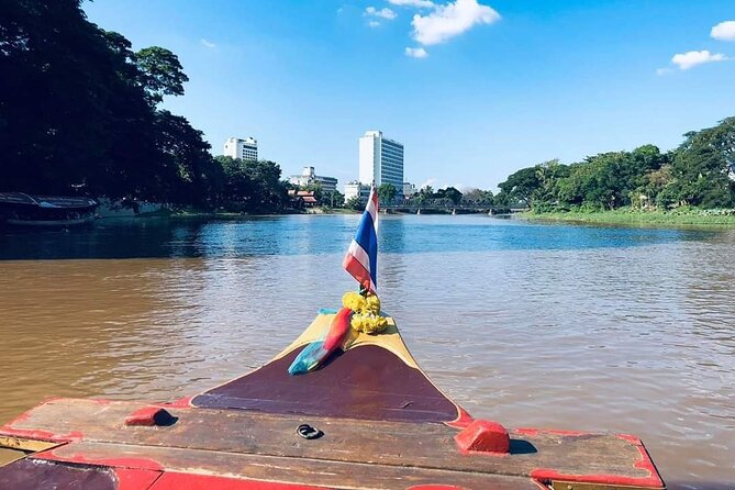 Half Day Private Chiang Mai Trishaw Ride and Mae Ping River Cruise - Wat Phra Singh and a strong finish
