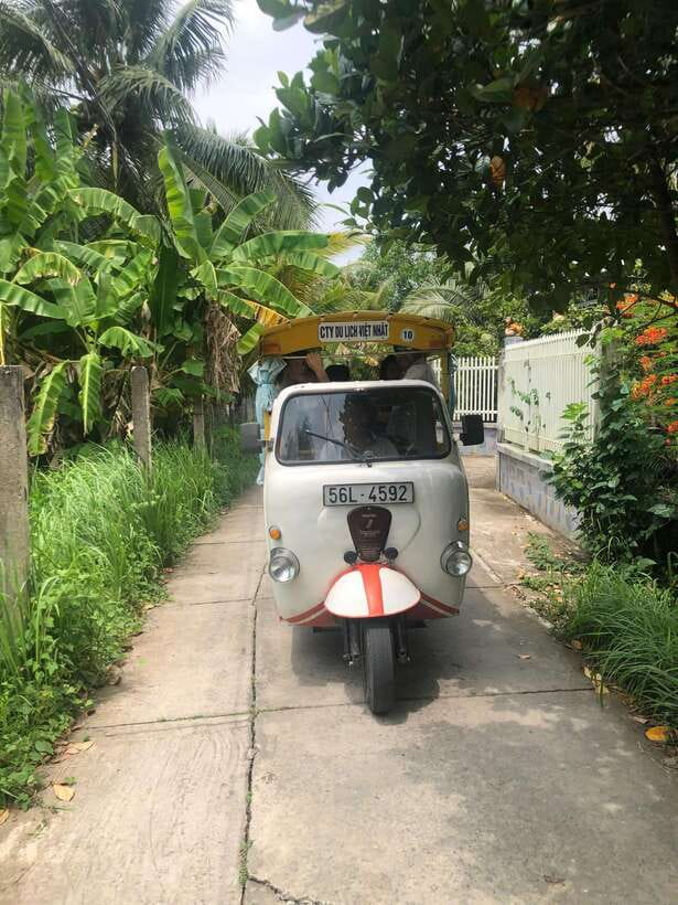 HCM: Mekong Delta Islands Boat & Tuk-Tuk Tour with Tastings - Lunch, tropical fruit, and southern folk music