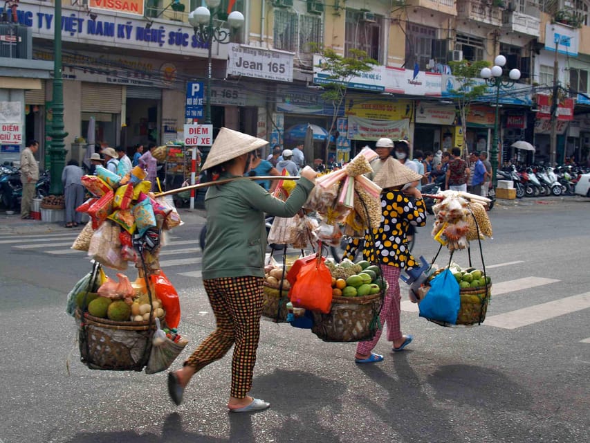 Ho Chi Minh City: City Highlights Tour by Cyclo - Binh Tay Market: architecture and everyday shopping