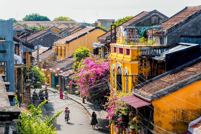 Hoi An Rickshaw Riding/Carpentry or Ceramic Class by Foodie Tour - The Japanese Bridge, assembly halls, and old houses
