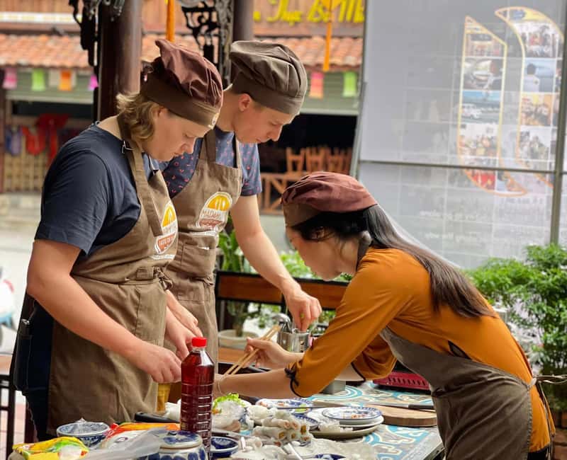 Hue City: Cyclo, Market Tour & Cooking Class at Madam Thu - Folding Bánh Nậm and rolling Nem Rán
