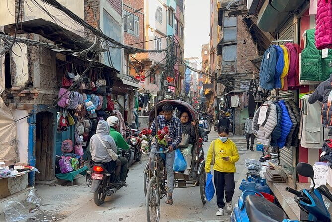 Kathmandu: Food, Drink and Shopping Rickshaw Tour - Street snacks and the sugarcane stop