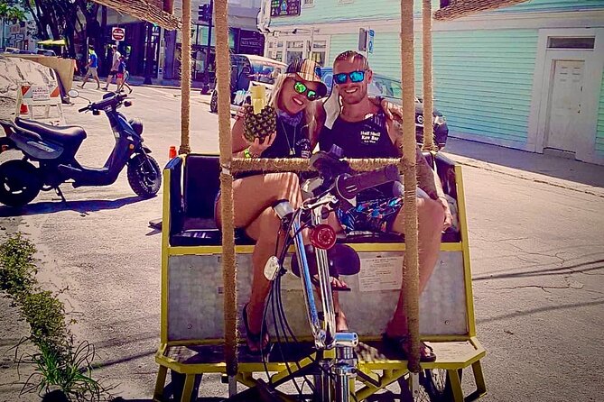 Key West Conch Republic Tiki Pedicab Experience by Kokomo Cabs - A shaded ride through Key West instead of a crowded vehicle