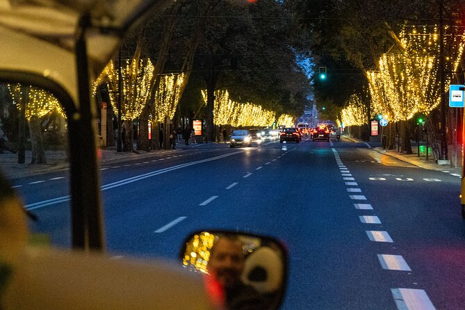 Lisbon Christmas Lights Tuk-Tuk Tour with Local Guide - Avenida da Liberdade under golden lights