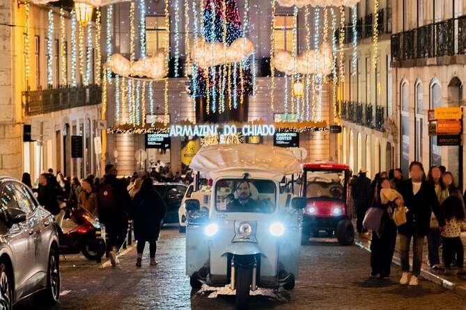 Lisbon Christmas Lights Tuk-Tuk Tour with Local Guide - Commerce Square and the giant Christmas tree