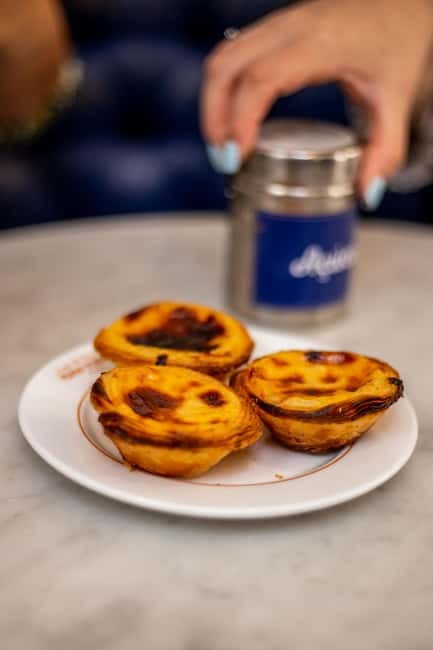 Lisbon: Food Tasting Tour by Tuk Tuk with 2 Stops - Guides shape the experience