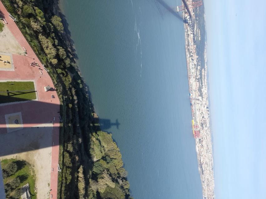 Lisbon: Private Tuk Tuk Tour Christ the King & Abril Bridge - Crossing the 25 de Abril Bridge