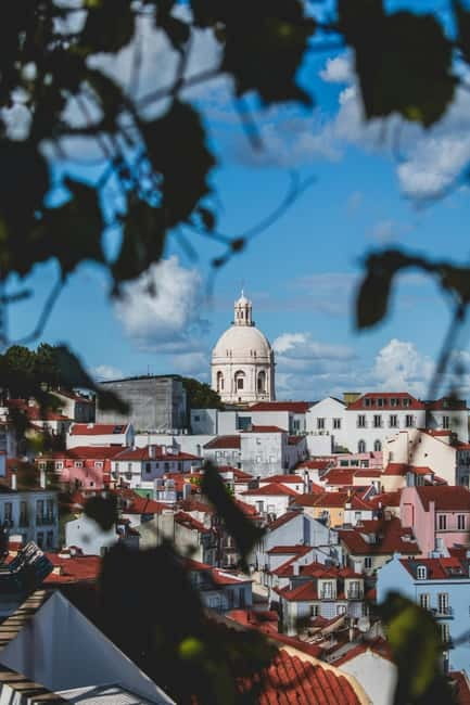Lisbon: Private Tuk Tuk Tour with Professional Guide - Why a tuk tuk works well in hilly Lisbon