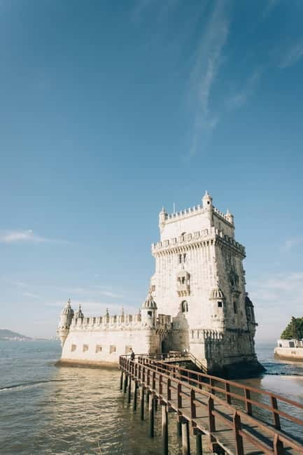 Lisbon: Private Tuk Tuk Tour with Professional Guide - Guide style, languages, and private-group value