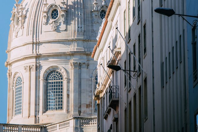 Lisbon's 7 Hills on Tuk-Tuk - Churches, dynastic history, and the Feira da Ladra