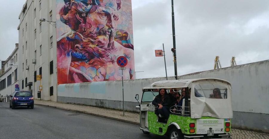 Lisbon Street Art by Tuk Tuk : Graffiti & Murals Discovery - Portas do Sol adds the classic Lisbon view