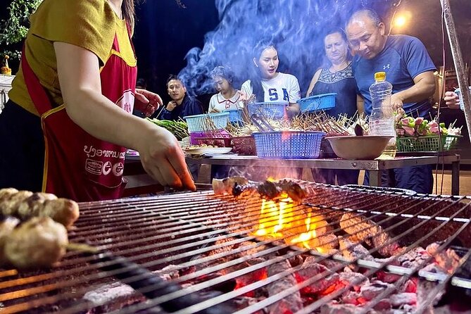 Luang Prabang Evening Food Tour by Tuk-Tuk - Hot pot, BBQ, and the pleasures of cooking at the table