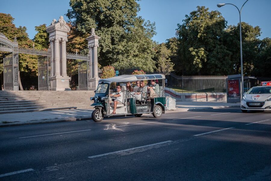 Madrid: Private City Tour by Eco Tuk Tuk - The Prado, Neptune Fountain, and the Paseo del Prado
