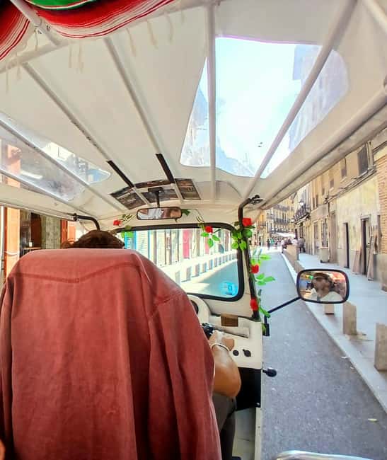 Madrid: Private Tuk-Tuk Tour Highlights - Riding through Madrid’s historic streets