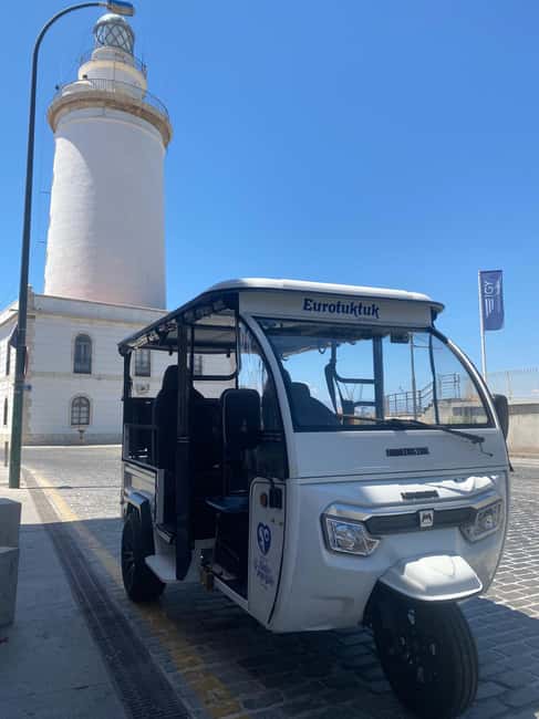 Malaga: Christmas Night Tour and Lights with Tuk Tuk - Starting at Real Club Mediterráneo and La Farola
