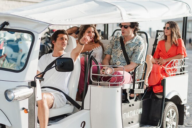 Malaga Expert Tour with Local Guide in Eco Tuk Tuk Private - Civic Malaga: university, bank, and town hall