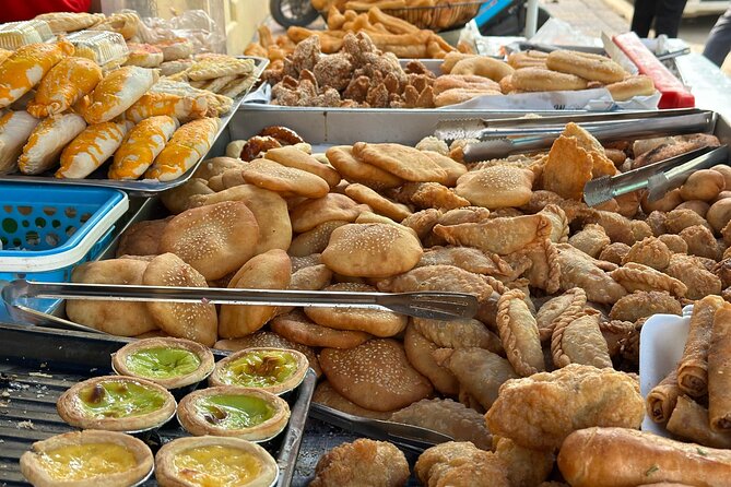 Morning Tuk Tuk Food Tour: Taste Iconic Dishes of Battambang - Grilled meats, spring rolls, tea, and Mikola