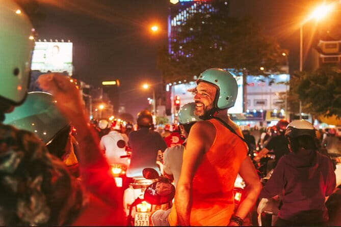Night Food Tour in Saigon By Scooter - Starting at Nguyen Du and heading into local Saigon