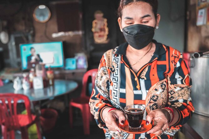 Phnom Penh Morning Market & Food Tour by Tuktuk - Includes All Food & Drinks! - Stop 5: Yellow turmeric crepes