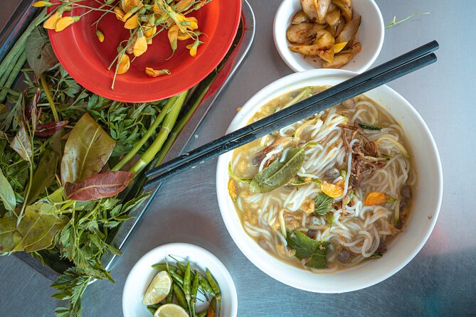 Phnom Penh’s Culinary Underground: Local Food Tour by Tuk-tuk - Stop five: Fish amok and curry at Eleven One Kitchen