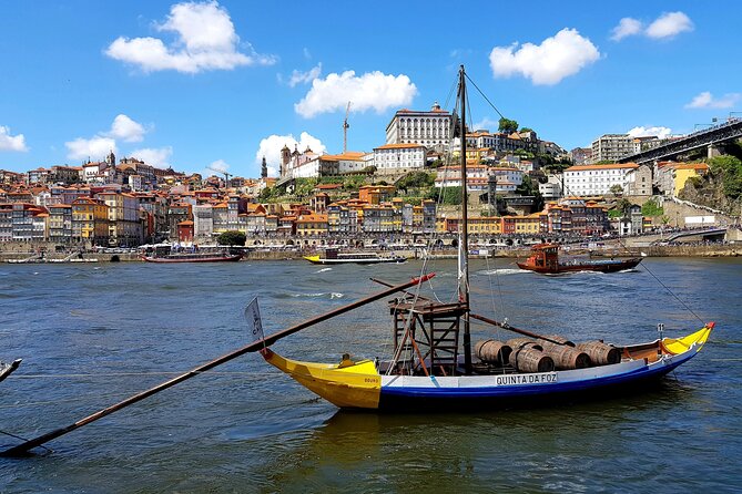 Porto Half Day Private Tuk Tuk Tour - Crossing the Dom Luís I Bridge into Gaia